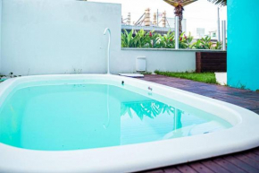 Praia e Piscina em Palmas do Arvoredo